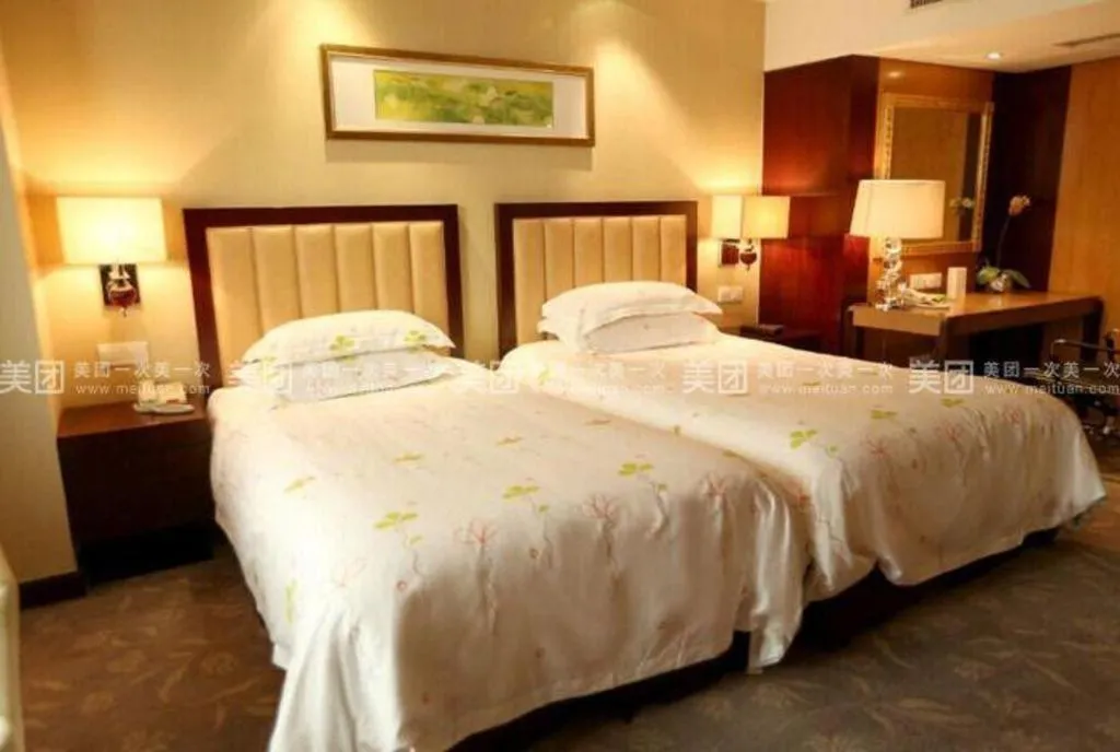 Bed in New Century Shaoxing Grand Hotel