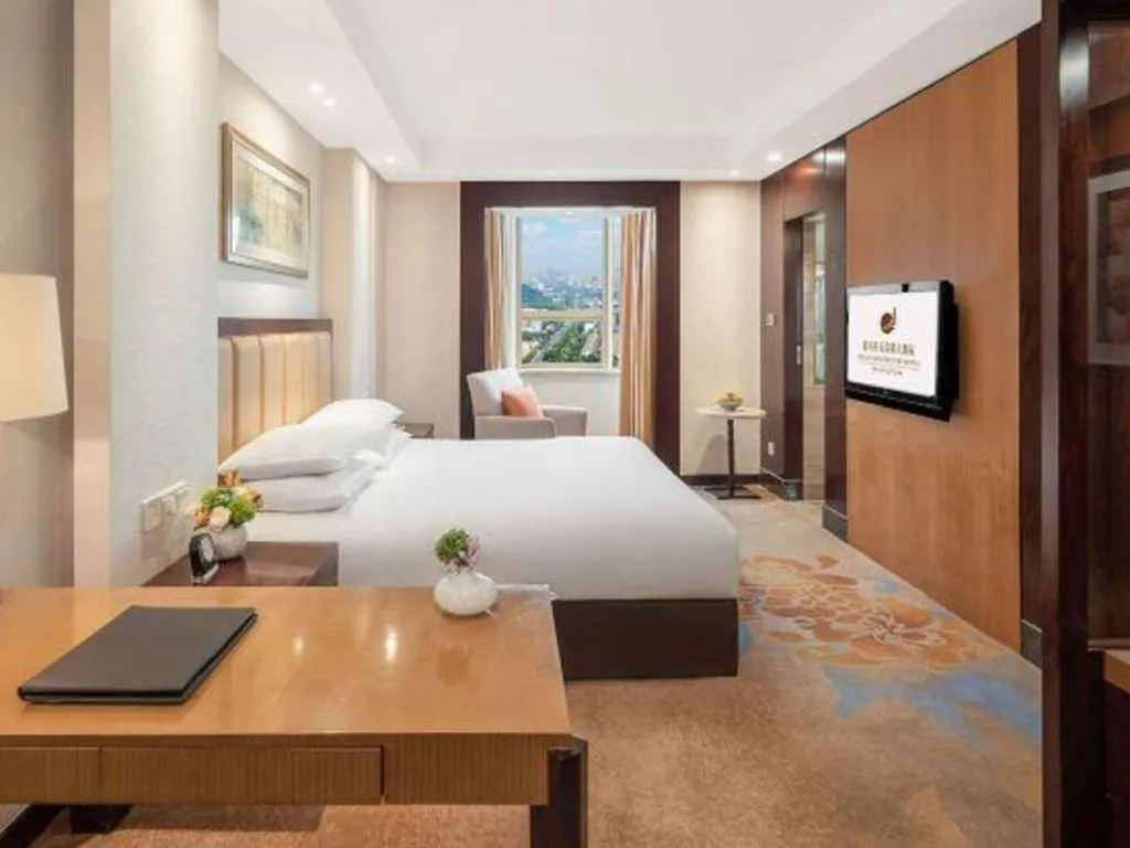 Bed in New Century Shaoxing Grand Hotel