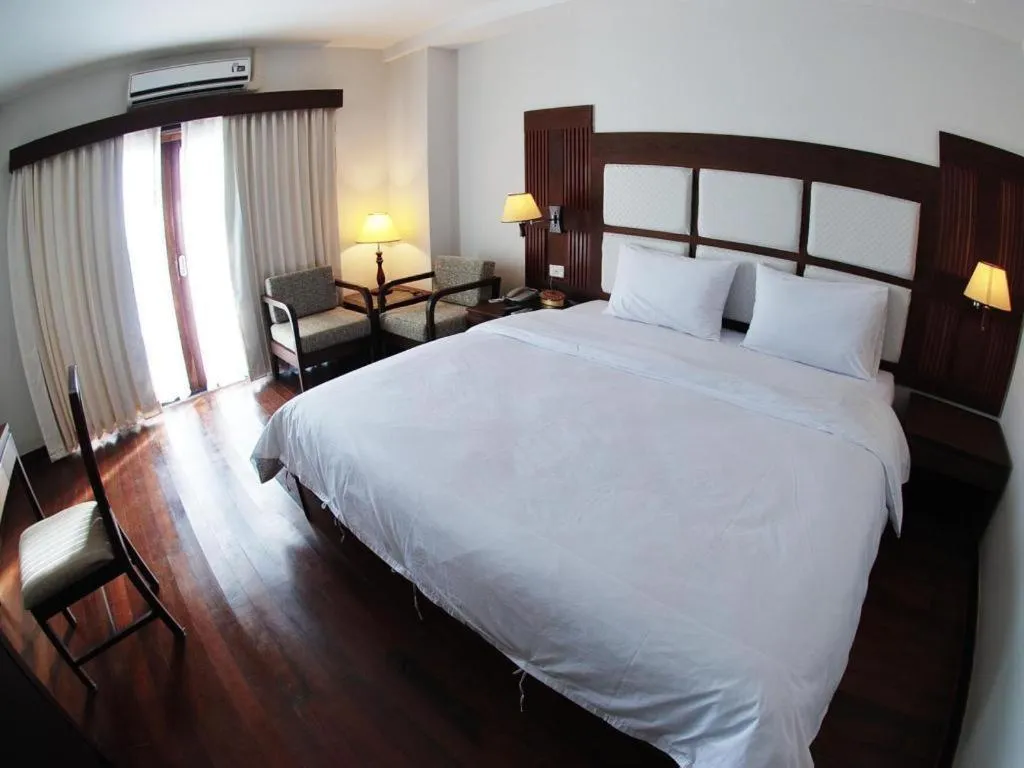 Bed in River City Hotel