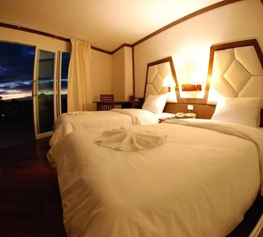 Bed in River City Hotel