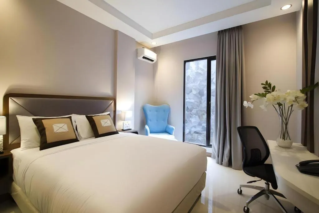 Bed in Sawana Suites