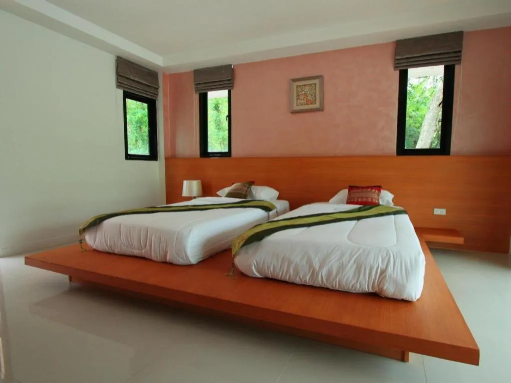 Bed in Phakawan Hotel