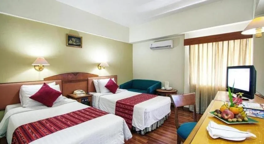 Bed in Sahid Kawanua Hotel