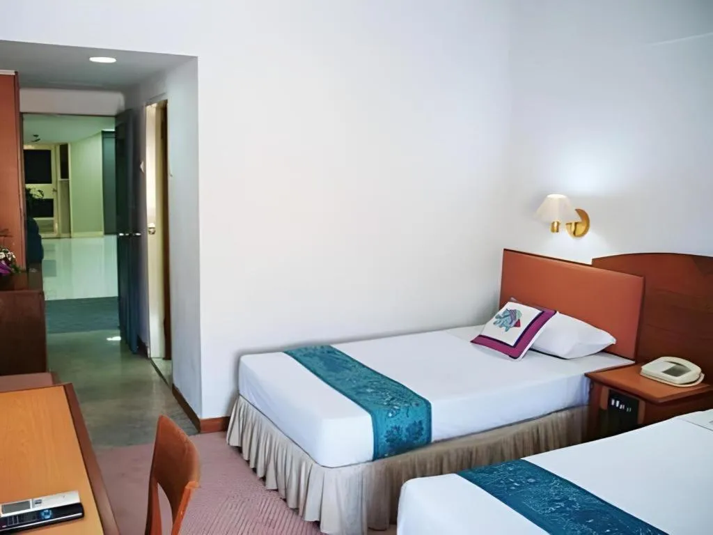 Bed in Sahid Kawanua Hotel