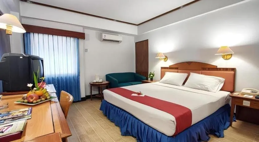 Bed in Sahid Kawanua Hotel