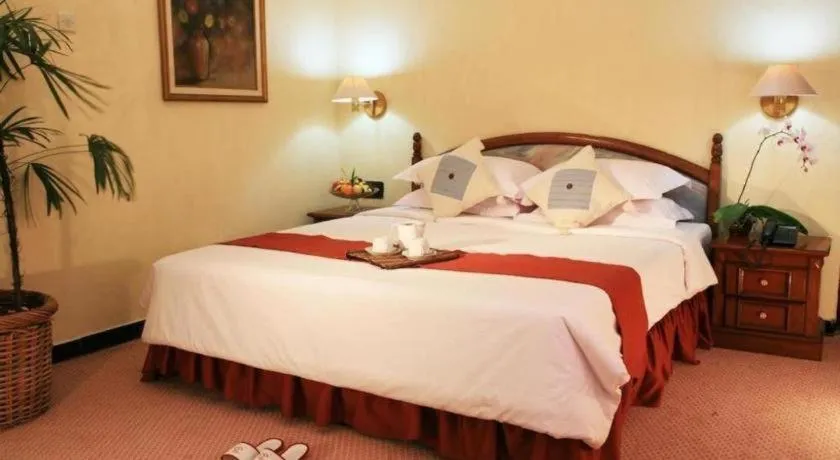 Bed in Sahid Kawanua Hotel