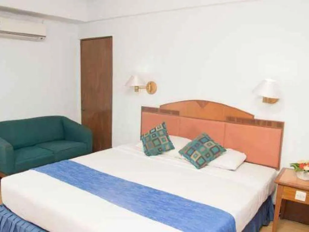 Bed in Sahid Kawanua Hotel