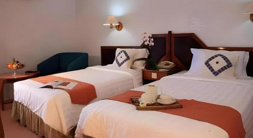 Bed in Sahid Kawanua Hotel