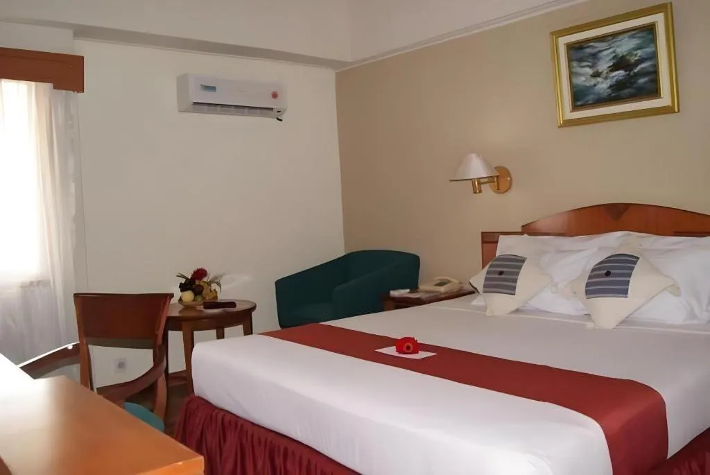 Bed in Sahid Kawanua Hotel