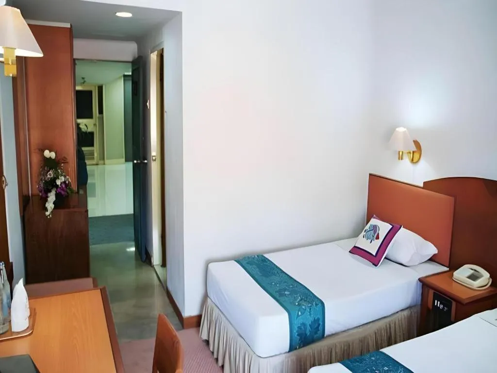 Bed in Sahid Kawanua Hotel