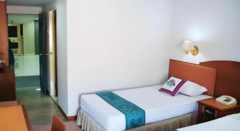 Bed in Sahid Kawanua Hotel