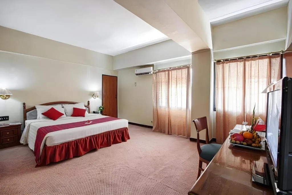 Bed in Sahid Kawanua Hotel