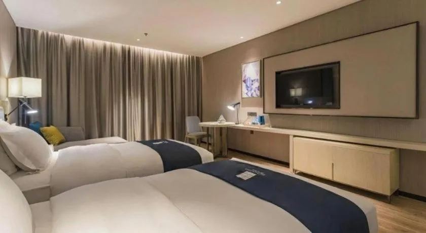 Bed in Echarm Hotel Nanchang Hongcheng Wangfujing