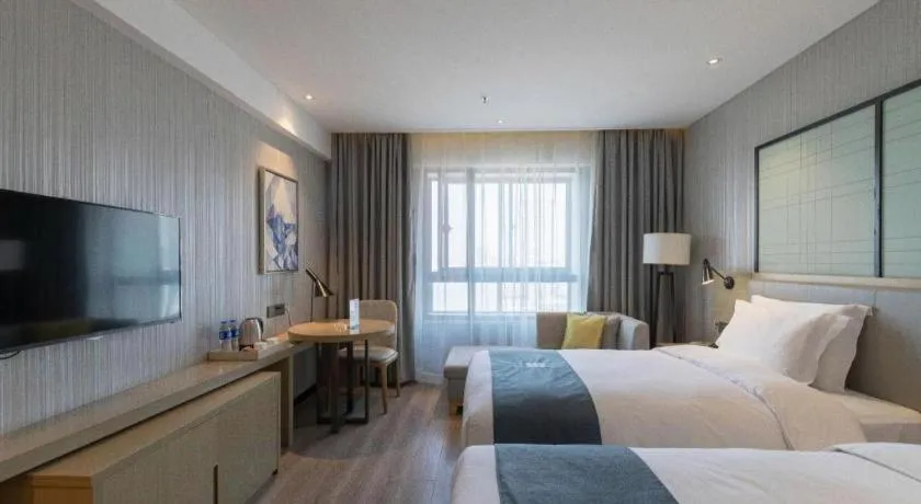 Bed in Echarm Hotel Nanchang Hongcheng Wangfujing