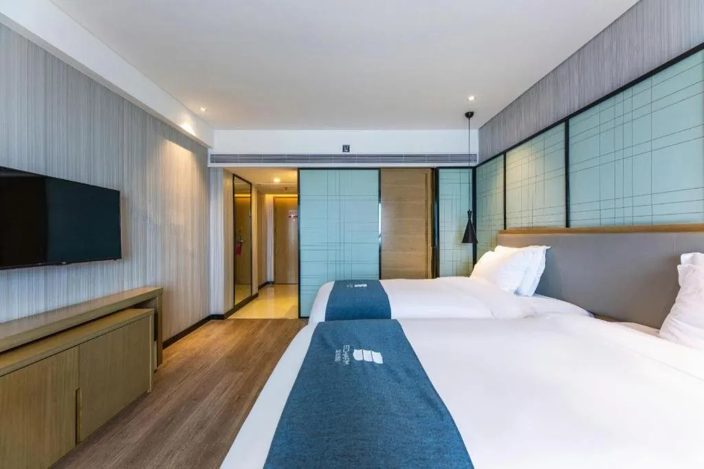 Bed in Echarm Hotel Nanchang Hongcheng Wangfujing