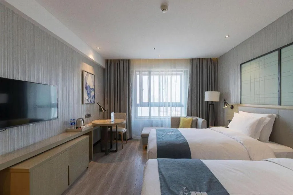 Bed in Echarm Hotel Nanchang Hongcheng Wangfujing