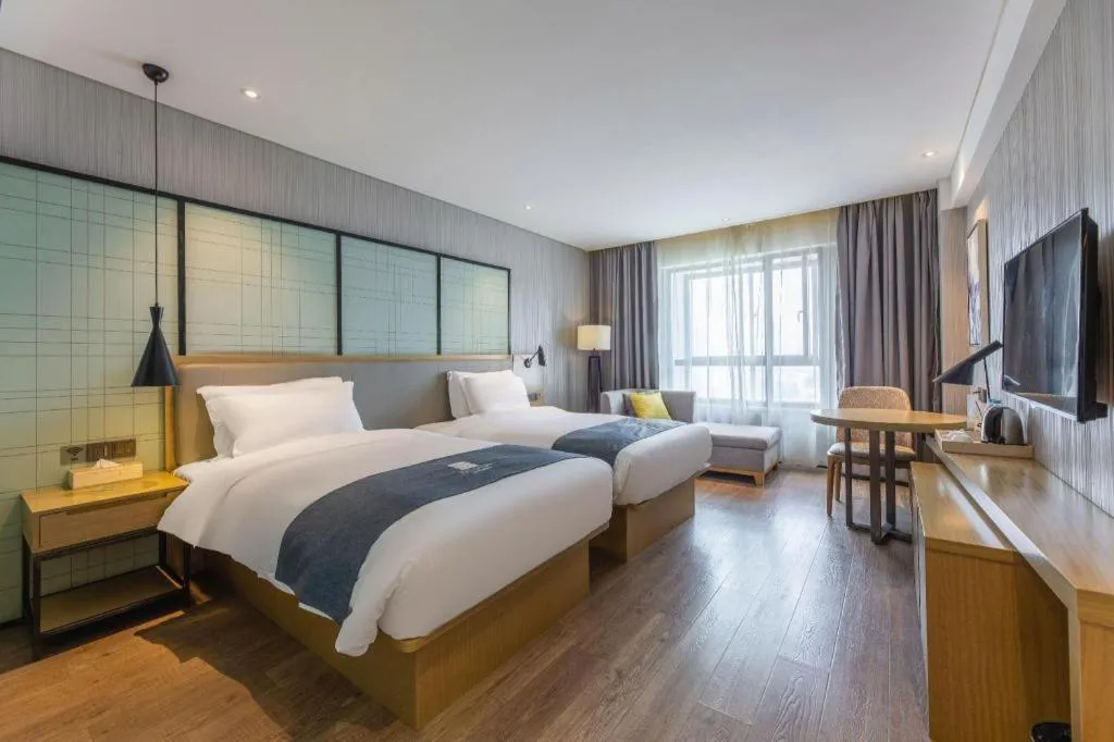 Bed in Echarm Hotel Nanchang Hongcheng Wangfujing