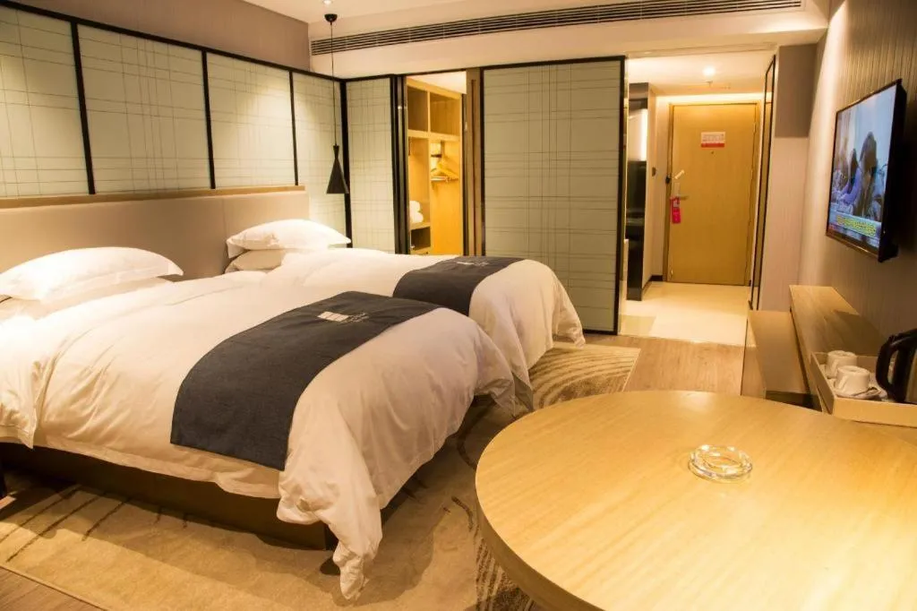 Bed in Echarm Hotel Nanchang Hongcheng Wangfujing