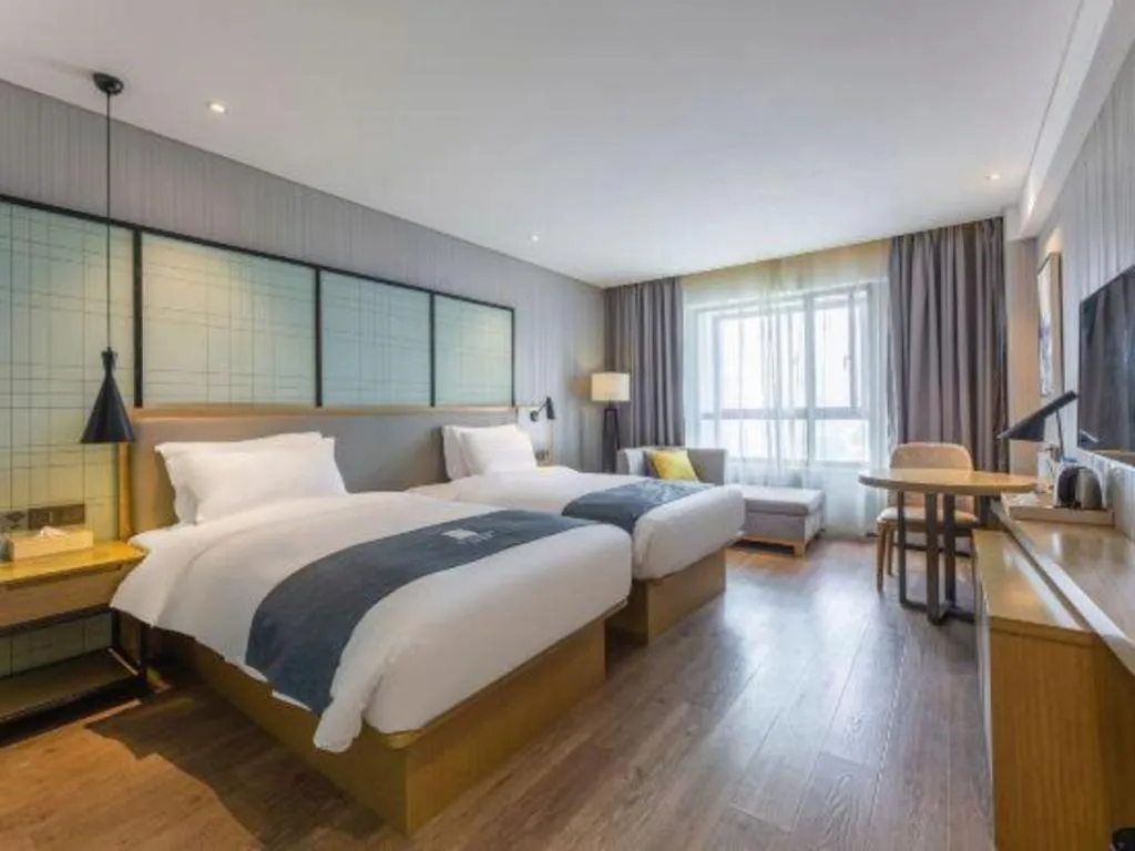 Bed in Echarm Hotel Nanchang Hongcheng Wangfujing