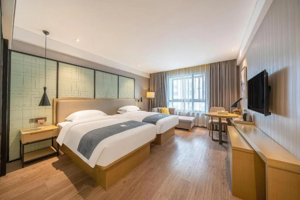 Bed in Echarm Hotel Nanchang Hongcheng Wangfujing