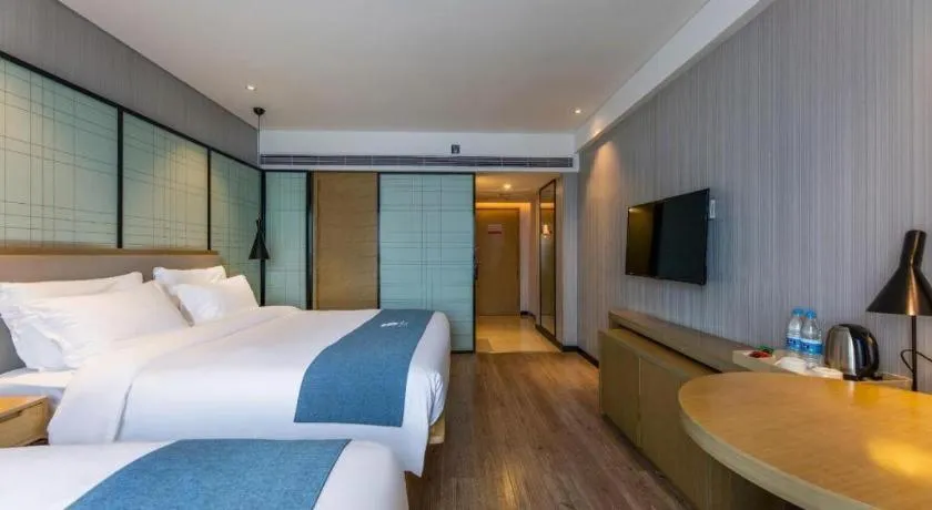 Bed in Echarm Hotel Nanchang Hongcheng Wangfujing