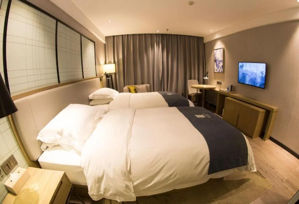 Bed in Echarm Hotel Nanchang Hongcheng Wangfujing