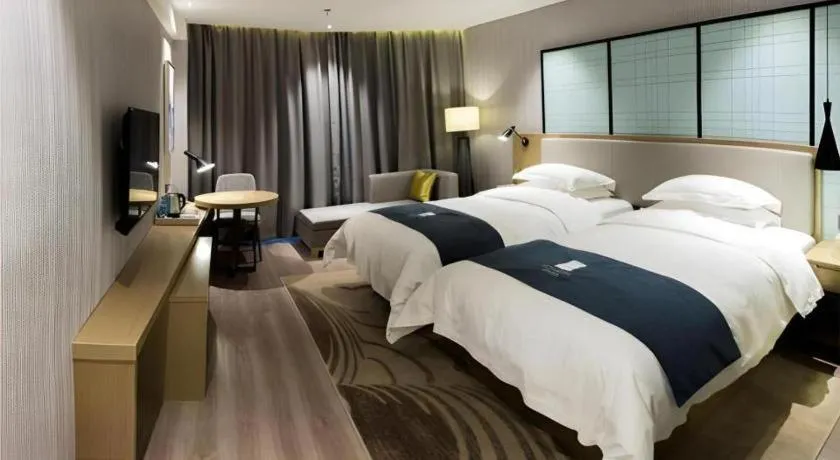 Bed in Echarm Hotel Nanchang Hongcheng Wangfujing