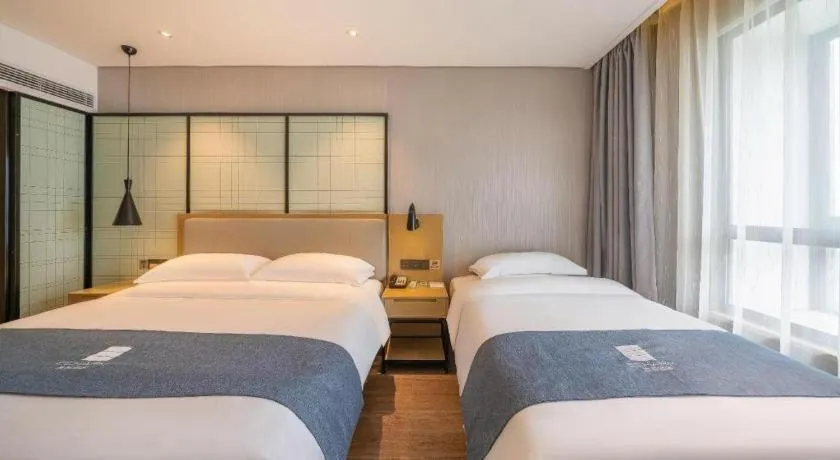 Bed in Echarm Hotel Nanchang Hongcheng Wangfujing