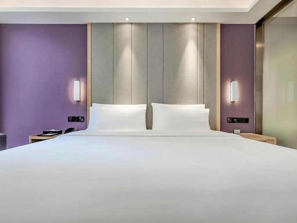 Bed in Lavande Hotel·Xishuangbanna Jinghong Songkran Square