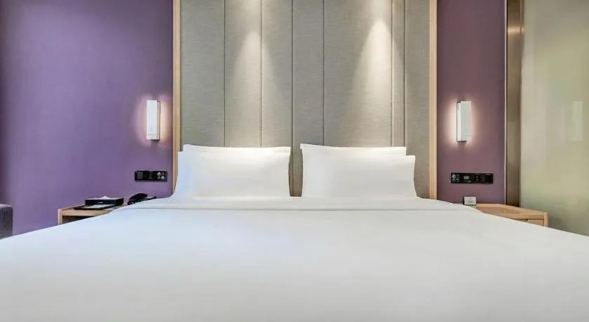 Bed in Lavande Hotel·Xishuangbanna Jinghong Songkran Square