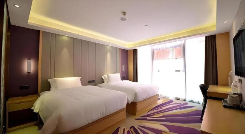 Bed in Lavande Hotel·Xishuangbanna Jinghong Songkran Square