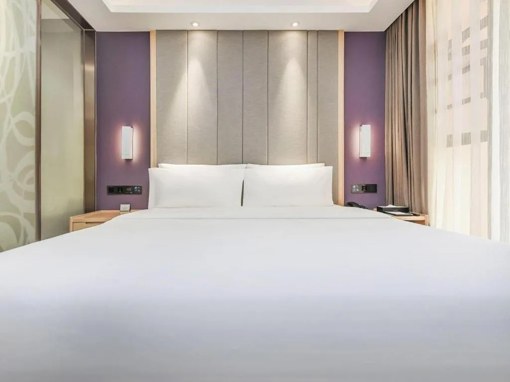 Bed in Lavande Hotel·Xishuangbanna Jinghong Songkran Square