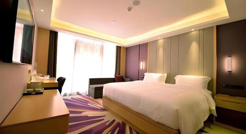 Bed in Lavande Hotel·Xishuangbanna Jinghong Songkran Square