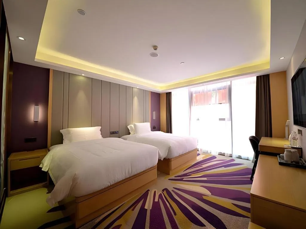 Bed in Lavande Hotel·Xishuangbanna Jinghong Songkran Square