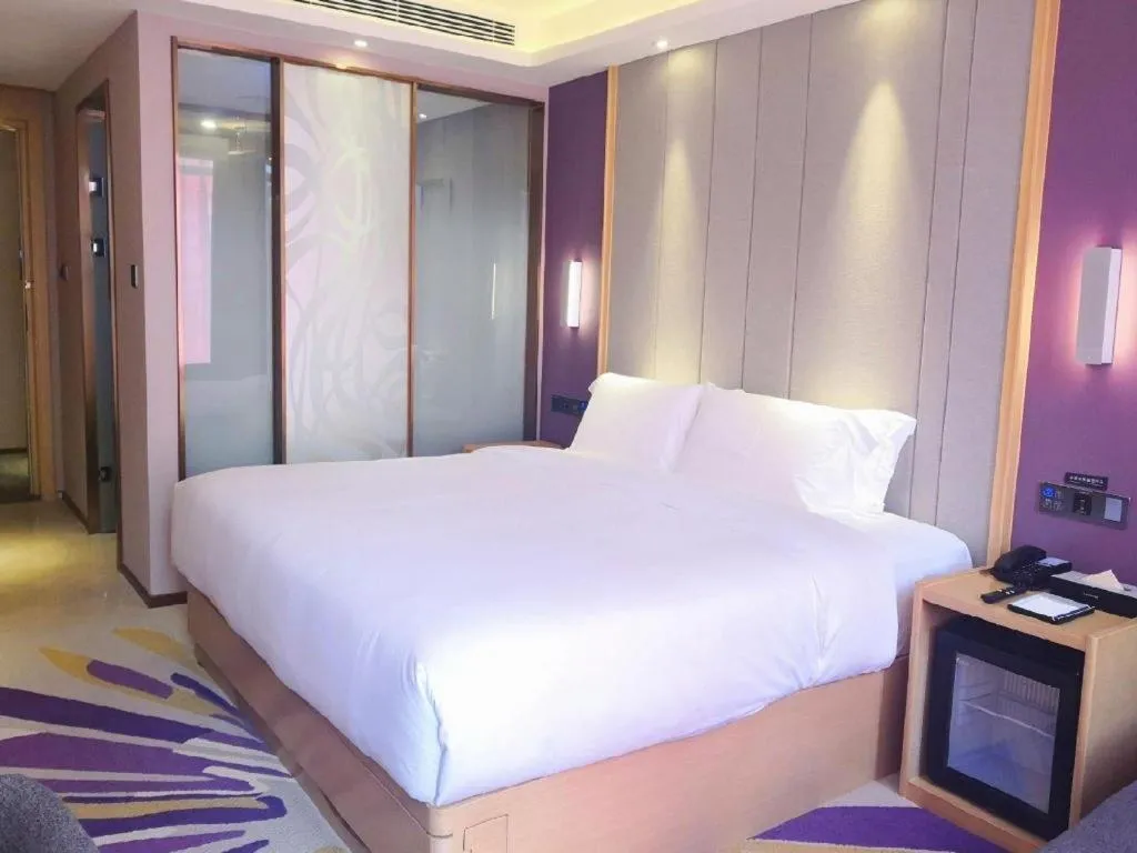 Bed in Lavande Hotel·Xishuangbanna Jinghong Songkran Square