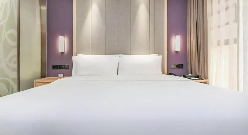 Bed in Lavande Hotel·Xishuangbanna Jinghong Songkran Square