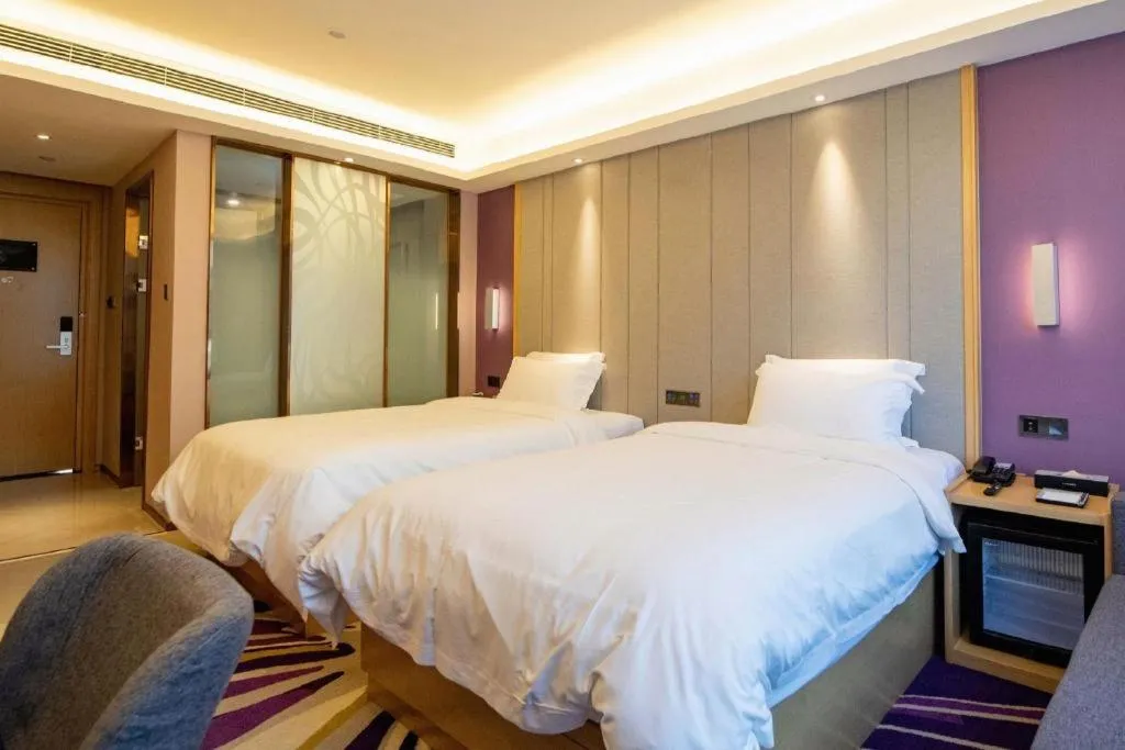 Bed in Lavande Hotel·Xishuangbanna Jinghong Songkran Square