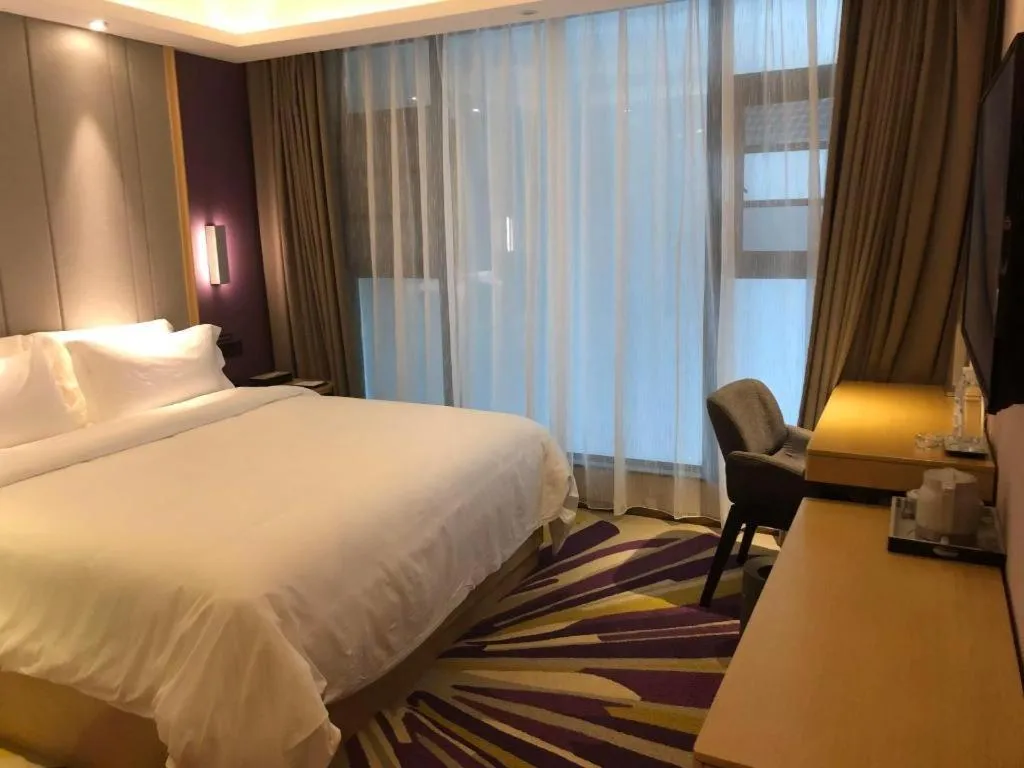 Bed in Lavande Hotel·Xishuangbanna Jinghong Songkran Square