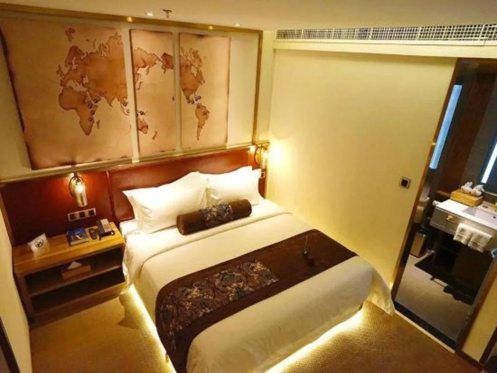 Bed in James Joyce Coffetel Beijing Yizhuang Rongjing East Street Subway Station