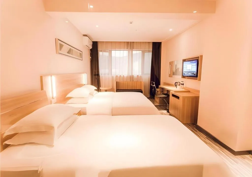 Bed in City Comfort Inn Chibi Railway Station