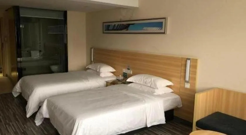 Bed in City Comfort Inn Chibi Railway Station