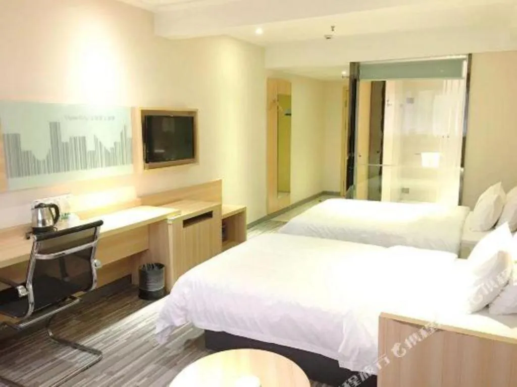 Bed in City Comfort Inn Chibi Railway Station