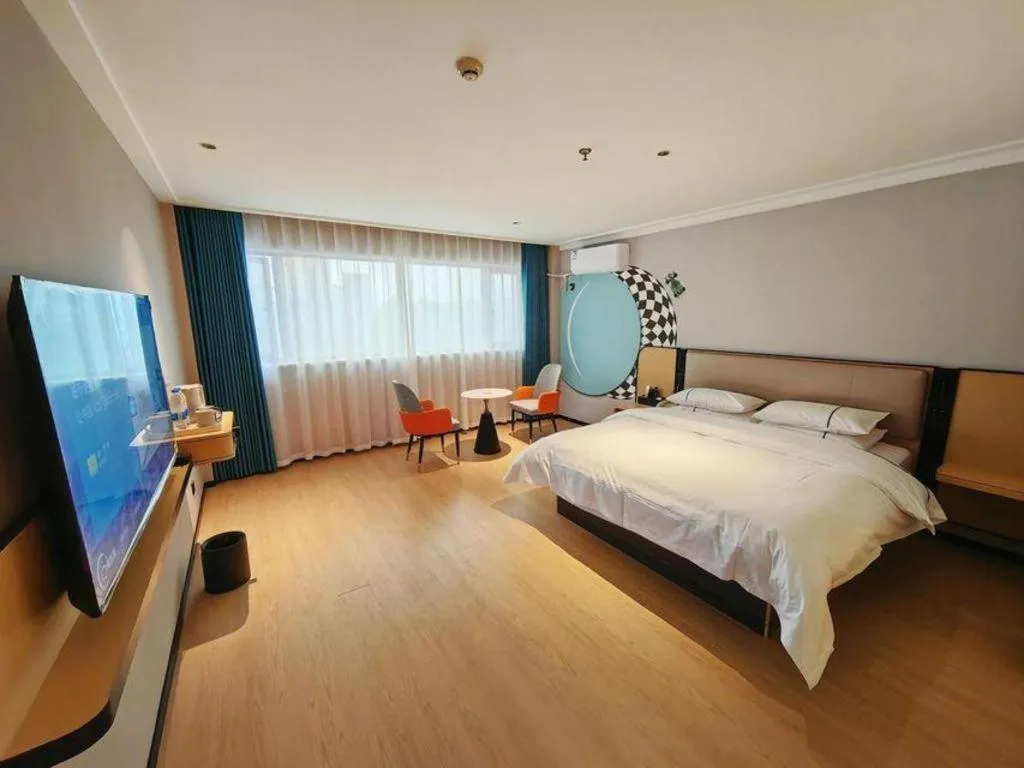 Bed in City Comfort Inn Chibi Railway Station