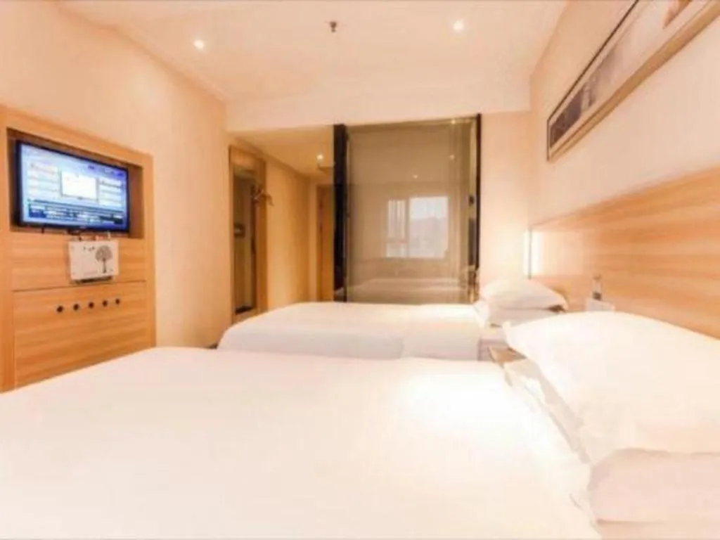 Bed in City Comfort Inn Chibi Railway Station