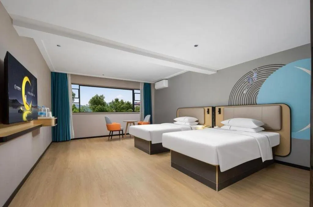 Bed in City Comfort Inn Chibi Railway Station