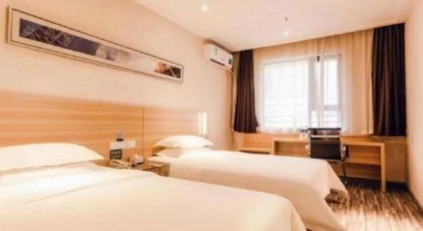 Bed in City Comfort Inn Chibi Railway Station