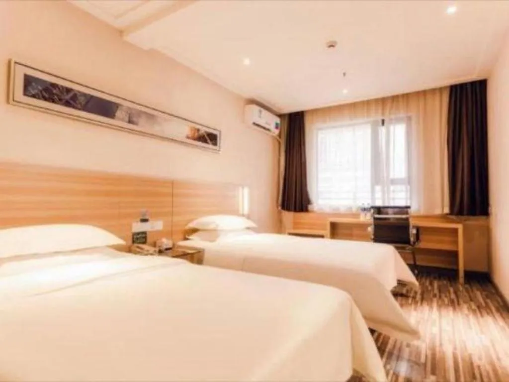 Bed in City Comfort Inn Chibi Railway Station