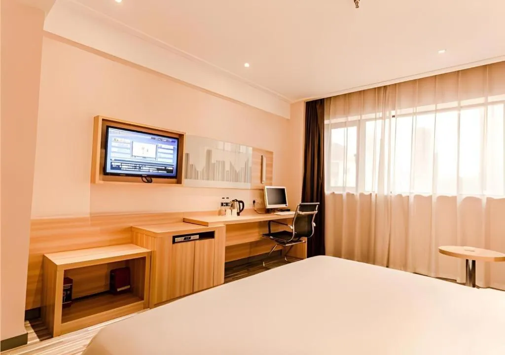 Bed in City Comfort Inn Chibi Railway Station