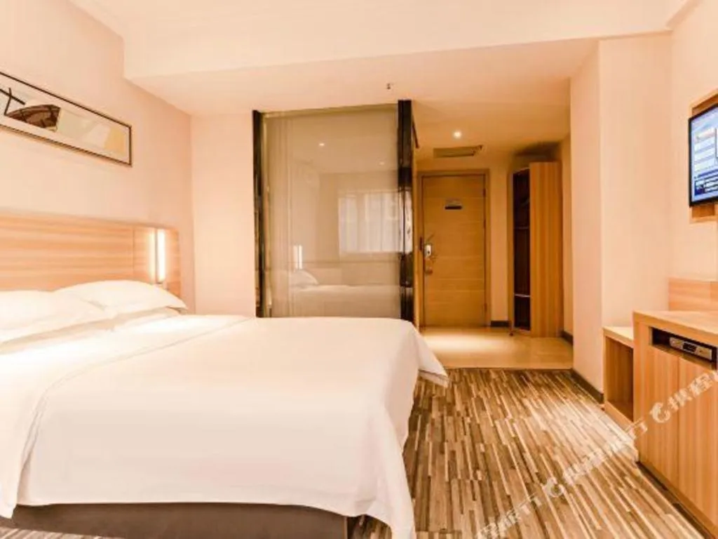 Bed in City Comfort Inn Chibi Railway Station