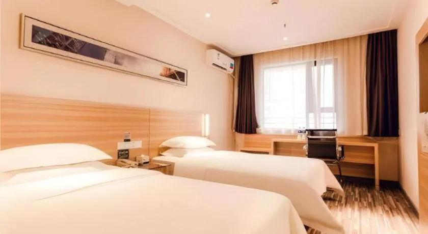 Bed in City Comfort Inn Chibi Railway Station